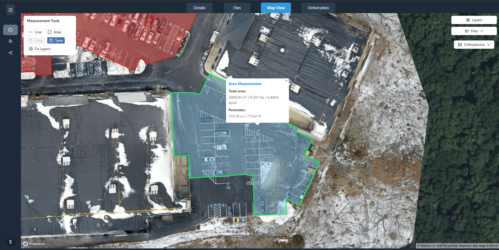 Map view showing multiple area measurements with detailed popup displaying area and perimeter calculations